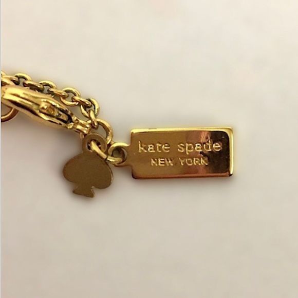 KATE SPADE Gold Tone Gold Enamel Bow Long Necklace - Picture 6 of 14